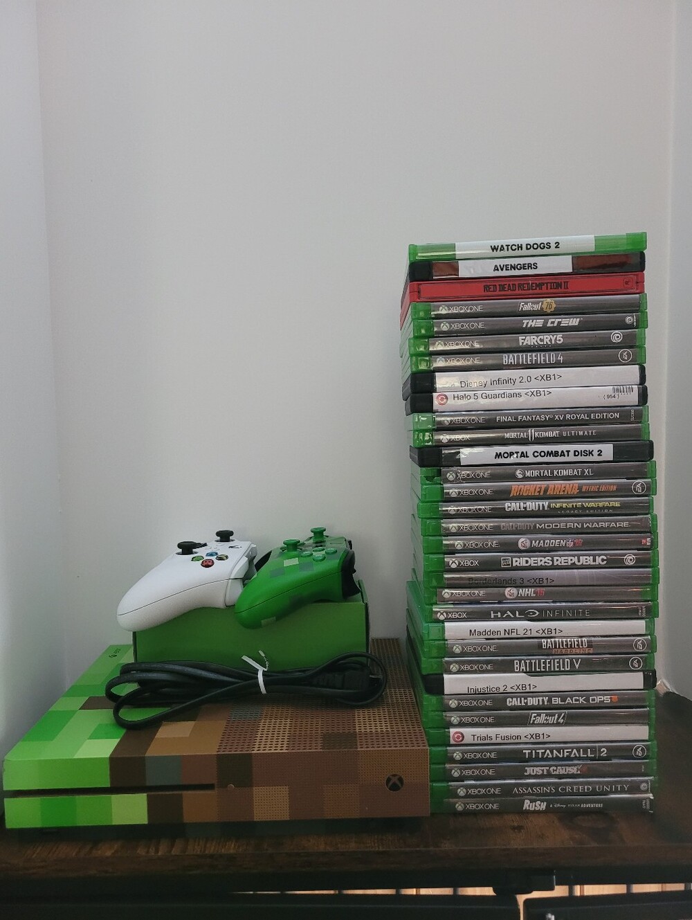 Xbox One Mincraft Addition Bundle with 2 Controllers, 32 Games,and Charger Dock.